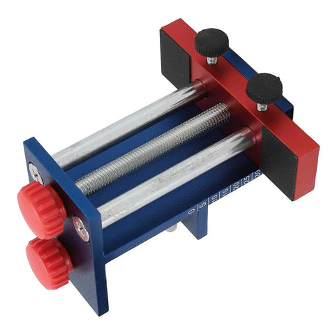 Rock Solid Cabinet Face Frame Clamps Hella Sturdy Aluminum Alloy Clamping Gear For Smooth Woodworking Installation and Precise Universal Alignment With Heavy Duty Grip viewed from the top with red knobs.