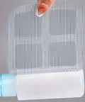 20 Pack Disposable Shower And Kitchen Drain Hair Catchers Keep Your Pipes Snatched With Dope Anti Clog Mesh Guards, showing a mesh strip in hand.