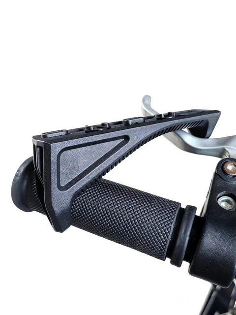 Close-up of road bike brake lever covers with soft rubber grips and textured surface for no slip comfort on cycling shifters.