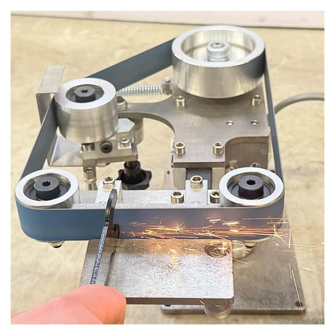 Powerful Vertical And Horizontal Belt Sander Machine For High Speed Metal Grinding Polishing, showcasing sparks during knife sharpening.