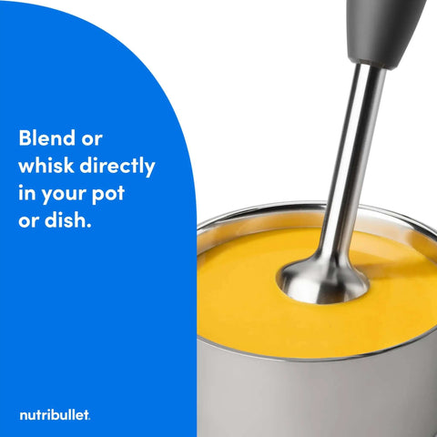 Heavy Duty Yet Slick Handheld Immersion Blender With Rugged Stainless Shaft And Versatile Whisk Hook For Pureeing Soups Whipping Cream And Mixing Batter Like A Pro Without Breaking A Sweat, blending yellow soup.