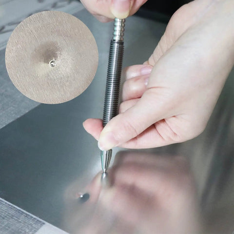 Using Dual Head Hammerless Nail Setter And 3/16 In Center Punch With 3500 PSI Striking Force on metal surface