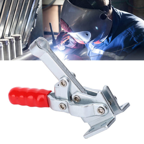 Heavy Duty Toggle Clamp With 150kg Clamping Force Horizontal Plunger Stroke Welding Hold Down Clamp For Woodworking Jigs And Fixtures Quick Release Hand Tool For Easy Secure Workpiece Positioning In Jigs, shown in front of a welder in action.