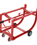 Heavy Duty 55 Gallon Drum Cradle With 600 Lb Capacity And Sturdy Steel Build Perfect For Moving Barrels Around The Shop Using Easy Drawbar Design, showing red steel frame with wheels.