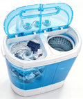 No Sweat Portable Twin Tub Wash And Spin Combo 9.9 Pounds Mini Top Load Laundry Machine with clothes washing in blue water.