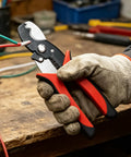 Get Your Hands On This Badass 8 Inch Wire Stripper And Cable Cutter Pliers Multi-Function Electrical Tool Perfect For Pros Who Need Precision Without Gunked Up Cores Or Snagged Wires During Any Home Reno Job You Can Handle It With Ease. A gloved hand holds an 8 inch steel wire stripper cutting green and red wires.