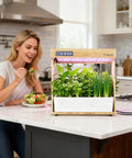 Indoor Hydroponic Garden System with 8 Pod Smart Grow Kit on kitchen countertop growing herbs and veggies with LED grow light