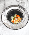 Heavy-Duty Kitchen Sink Strainer Set, 2 Dope Stainless Steel Mesh Drain Screens With Wide Rim in use with food debris