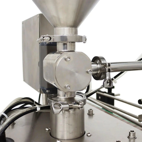 Automatic Servo Filling Machine For Pastes And Liquids Features Plug N Play Setup And No Sweat Operation Delivers Rock Solid Precision For Honey Jam Peanut Butter Sauces 100 To 1000 Ml Range close-up of stainless steel filling mechanism.