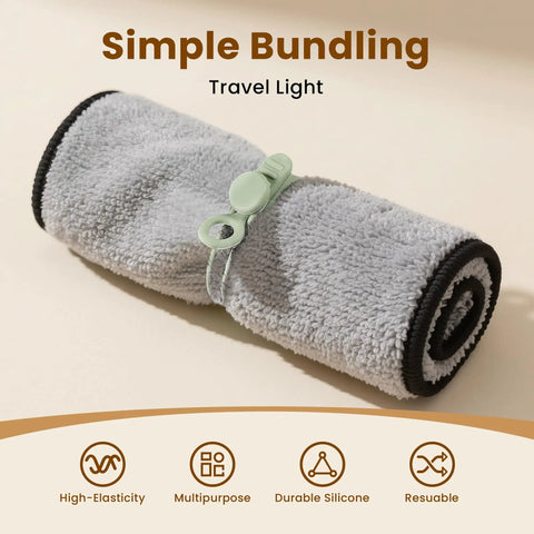 Silicone Cable Ties 10 Pack Reusable Wire Wraps For Office And Home Use securing a rolled towel with a green tie