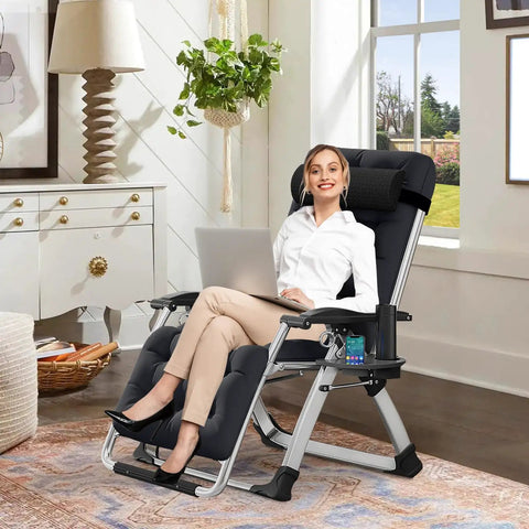 Woman using Cozy Folding Recliner Chair With Adjustable Back And Removable Cushion for indoor office relaxation.