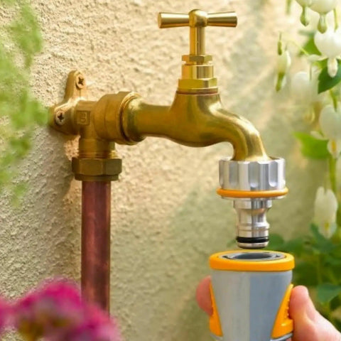 Person installing the No Brainer Do It Yourself Quick Connect Float Adapter Repair Kit For Plumbing Maintenance 17VB Replacement For Leaky Sinks And Faucets Durable Steel Build With Erosion Resistant Coating For Coastal Humid Environments onto an outdoor faucet.