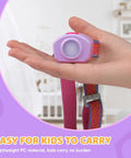Rechargeable Kids LED Headlamp With Lit RGB Color Cycle Adjustable Headband in hand, showing easy size for children