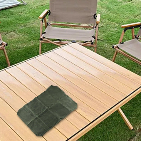 Army Green Waxed Canvas Roll Bag With 8 Slots For Knives Up To 17 Inches on outdoor table