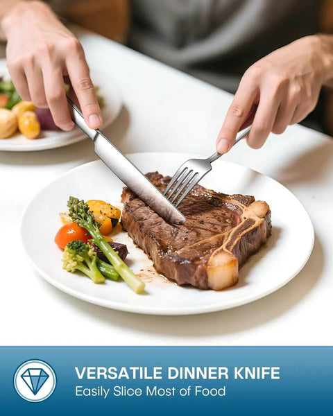 Person using fork and knife from 20 Piece Silverware Set For Four Built From Food Grade Stainless Steel Flatware with steak on plate