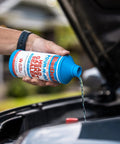 Pour N Go Head Gasket Sealer 16 Ounce Easy Do It Yourself Formula That Permanently Seals Engine Leaks No Tools Needed For Quick Long Lasting Car Maintenance pouring into engine