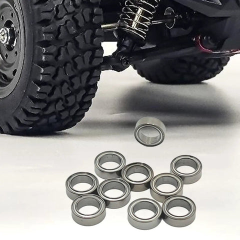 10 Piece RC Car Bearing Kit Go To Upgrade DIY Metal Ball Bearings next to RC truck tire for rugged off-road rigs