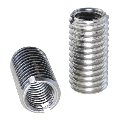 Two stainless steel threaded adaptor sleeves; M10x1.5 male to M8x1.25 female, metal repair inserts.