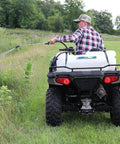 Person using 15 Gallon UTV And ATV Spot Sprayer With 1.0 GPM Pump, 40 PSI Max, Adjustable Spray Gun on grassy field