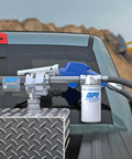 No Sweat Fuel Transfer Pump With Automatic Shut Off Nozzle And Premium Filter Kit 18 GPM 12 Volt Motor on truck bed.