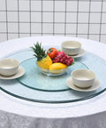 Heavy Duty Round Tempered Glass Turntable 24 To 33 Inch Lazy Susan For Kitchen Dining Tabletop with bowls and fruit