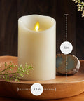 Cozy Ivory Flameless LED Pillar Candle With Moving Flame 3.5 By 5 Inch Real Wax Look Battery Operated Timer on wooden tray