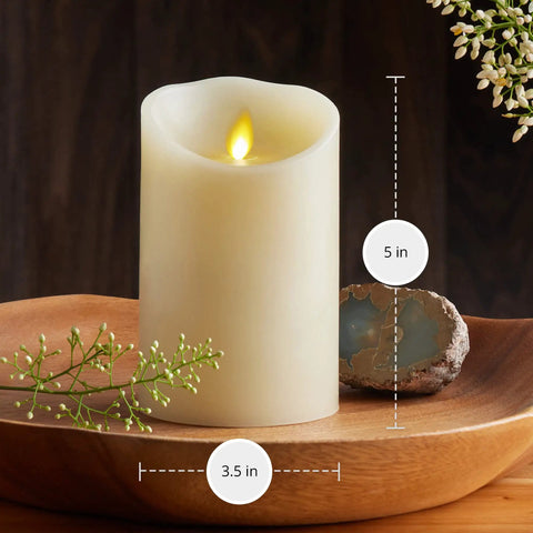 Cozy Ivory Flameless LED Pillar Candle With Moving Flame 3.5 By 5 Inch Real Wax Look Battery Operated Timer on wooden tray