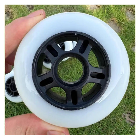 Close-up of inline skate wheels replacement set with durable bearings for roller skating indoors and outdoors.