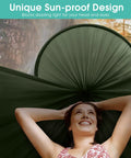 Two Person Pop Up Camping Hammock With Mosquito Net Lightweight Parachute Style Hanging Bed setup with sun-blocking feature in use