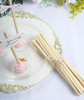 Hassle Free Pack Of Thirty Bamboo Dowel Rods And Wooden Craft Sticks Measuring Quarter Inch By Eight Inches Unfinished Natural Poles on decorative plate with cake pops.