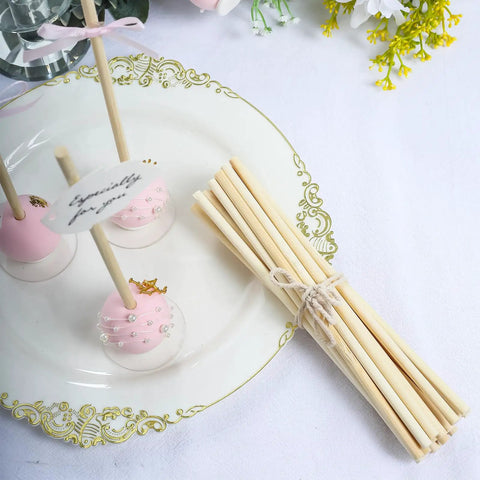 Hassle Free Pack Of Thirty Bamboo Dowel Rods And Wooden Craft Sticks Measuring Quarter Inch By Eight Inches Unfinished Natural Poles on decorative plate with cake pops.