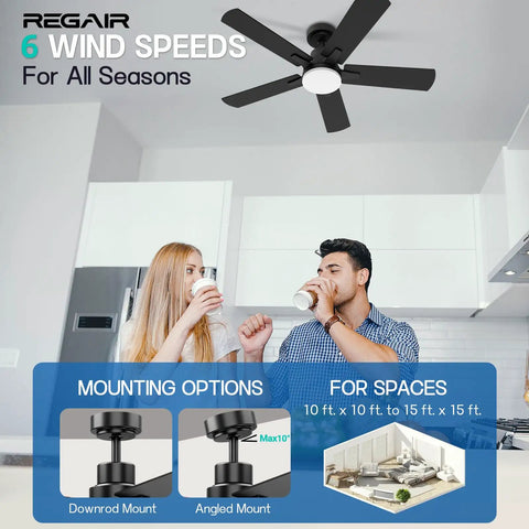 42 Inch White Ceiling Fan With Integrated Led Light And Smart Remote Dead Quiet Dc Motor Reversible Blades 3Cct Dimmable Timer For Bedroom Living Room Hassle Free Setup Big Cool Breeze Modern Decor in a stylish kitchen with two people.