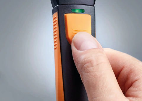 Handheld Air Velocity And Temperature Meter With In-Duct Airflow Measurement, CFM Readout, And A 15 Inch Telescoping Shaft For Easy Spot Checks, Bluetooth Connectivity And Mobile App Control For Quick Duct Diagnostics, orange button close-up