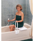 Woman using Portable Shower Bench For Tub With Adjustable Width Fits Most Bathtubs Contoured Seating For Maximum Comfort Supports Up To 300 Pounds