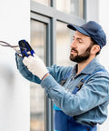 Technician using All In One Crimping Tool Kit For Ethernet And Phone Cables With RJ45 Cutter Wire Stripper And Network Crimper