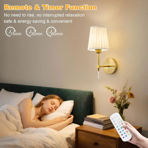 Gold Cordless Wall Sconces Set Of Two Battery Operated Rechargeable Dimmable Led Lamps With Fabric Shades Totally Wireless Home Lighting beside a bed with a woman sleeping.