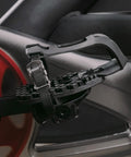 Close-up of Toe Clip Cage Adapters for Look Delta Pedals on spin bike, showcasing pedal conversion for sneakers.