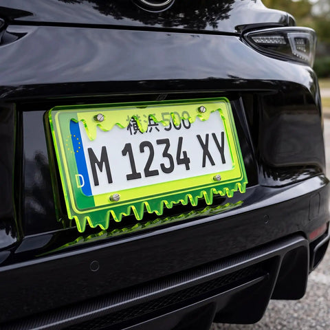 Glow In The Dark Dope Fluorescent Green Acrylic License Plate Frame With Screws Fits Standard 6x12 Inch Car Plates Transparent Universal Tag Frame Holder Scratch Resistant Clear Edges Style 1 on a black car.