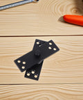 360 Degree Rotating Concealed Door Pivot Hinge In Heavy Duty Stainless Steel Black Finish shown on wooden surface