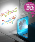 Doodle Projector Art Station For Kids With Reusable Drawing Discs And 6 Dry Erase Markers draws sharks on wall and ceiling