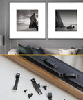 Top Shelf Heavy Duty Black Sawtooth Picture Hangers Supports 20 Lbs Rust Resistant Steel Wall Mount Hook Set 100 Pc Pack displayed with frames.