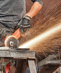 Worker using a Zip Wheel Cutoff Disc With Aluminum Oxide 7 In Diameter 5/64 In Thick 7/8 In Arbor Long Life Fast Cool Cutting Pack Of 25