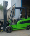 Rock Solid Industrial Hydraulic Forklift Truck With Three Ton Capacity And 15 Foot Mast Height Heavy Duty Material Handling Unit side view in warehouse.