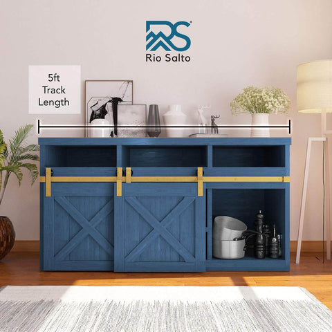 Brushed Gold 2 Door 60 Inch Mini Bypass Barn Door Hardware Kit installed on blue cabinet with visible 5ft track.