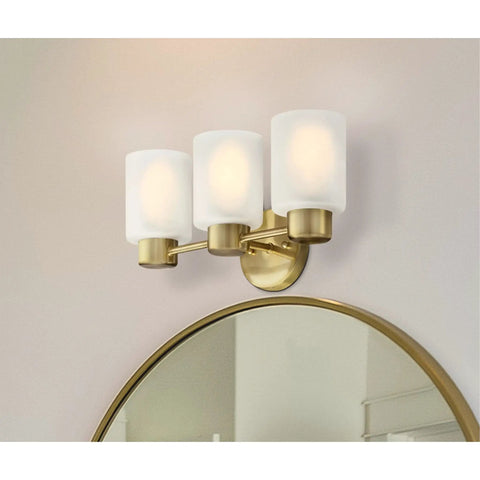 Three Light Wall Fixture In Champagne Brass Finish With Frosted Glass For Vanity Or Bath Mounts Up Or Down Transitional Modern Sconce Perfect Over Sink Adds Subtle Glam To Your Powder Room above a mirror