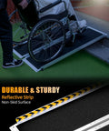 Premium 4 Foot Portable Wheelchair Ramp For Home Steps Features Non Slip Grip Built Tough Mobility Access Solution Rolls Super Smooth Over Thresholds Dead Simple Setup Done For You with a non-skid surface and reflective strip.