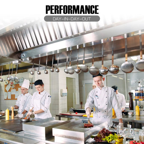 Chefs cooking in a commercial kitchen under a Heavy Duty Commercial Range Hood Grease Filters, 19.5W x 19.5H x 1.9In
