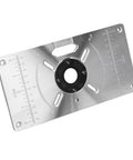 Top Shelf Aluminum Router Table Insert Plate With Four Tough Guide Rings For Rock Solid Woodworking and Knockout Precision Trimming Shop Gear and Upgrade Tools, angled view showing scale and guide rings.