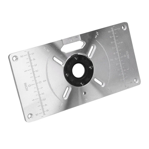Top Shelf Aluminum Router Table Insert Plate With Four Tough Guide Rings For Rock Solid Woodworking and Knockout Precision Trimming Shop Gear and Upgrade Tools, angled view showing scale and guide rings.