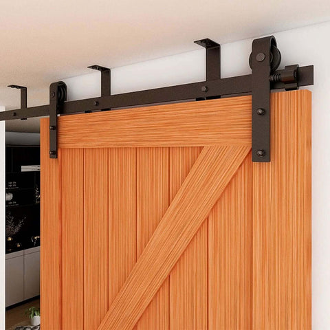 Ceiling Mount Sliding Barn Door Hardware Kit For Low Ceiling Spaces With L Shape Bracket System Fits 36 Inch Wide Single Wood Doors Heavy Duty Carbon Steel Hangers Supports Up To 220 Lb Per Door, shown installed on wood door.